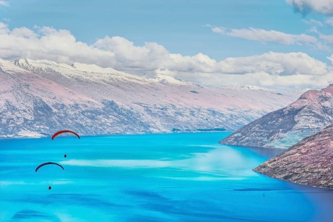 Paragliding over Lake Wakatipu, Queenstown, South Island, New Zealand, Oceania