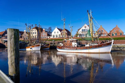 The fishing village of Greetsiel, historic fishing harbour, with the largest shrimp cutter fleet in
