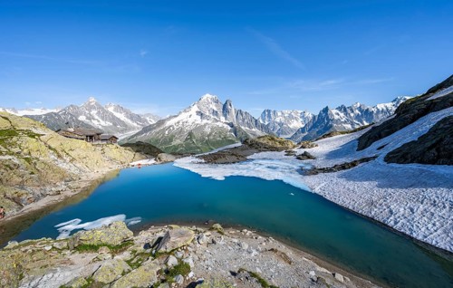 Mountain landscape with mountain lake Lac Blanc, mountain peaks, Aiguille Verte, Grandes Jorasses,