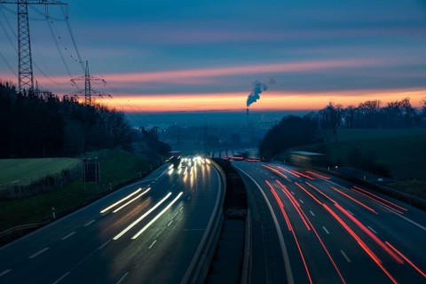 View from a bridge onto the A8 motorway near Augsburg at sunset, Augsburg, Bavaria, Germany, Europe