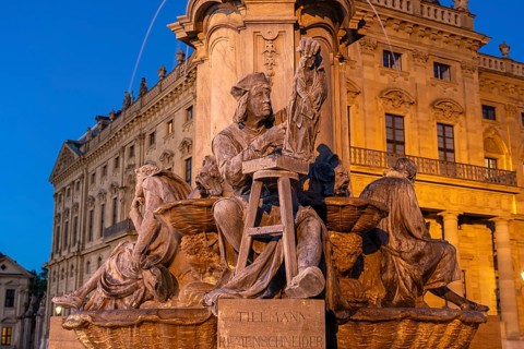 Statue of the sculptor and carver Tilman Riemenschneider at the Frankoniabrunnen in front of the