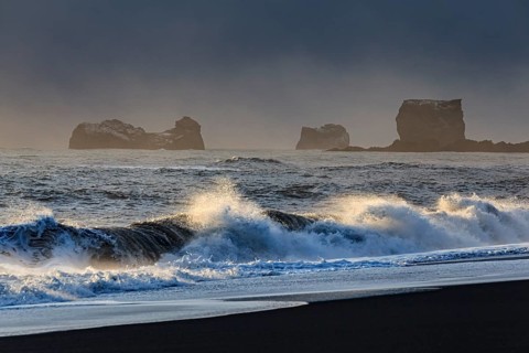 Snowy beach, waves, wind, dark clouds, winter, light mood, rocks, Dyrholaey, Vik, Iceland, Europe