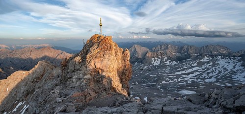 Impressive rocky mountain landscape in the evening light, summit of the Zugspitze with summit
