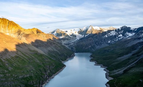 Picturesque mountain landscape at the summit Mont de la Blana at sunset, view of blue mountain