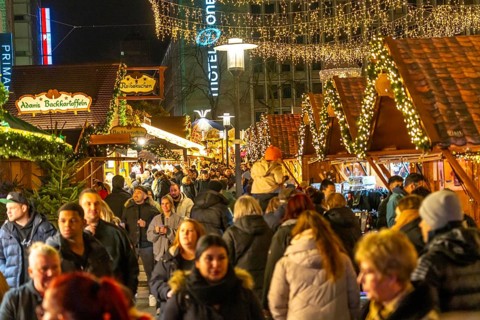 Pre-Christmas season, people, shoppers, visitors to the Christmas market in the city centre of
