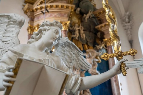 Angel in front of the altar by Nicodemus Tessin in the interior of the Evangelical Lutheran Church