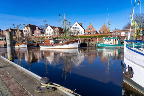 The fishing village of Greetsiel, historic fishing harbour, with the largest shrimp cutter fleet in