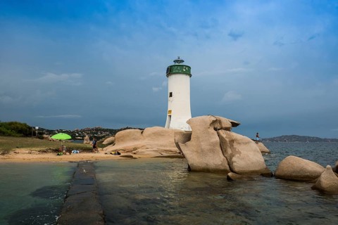 Lighthouse with beach and bizarre granite rocks, Spiaggia Porto Faro, Faro di Punta Palau, Palau,
