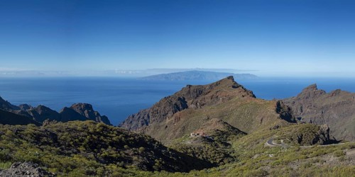 Volcanic rock formation and the Masca Gorge, Barranco de Masca, Teno Mountains, Tenerife, behind La