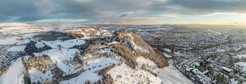 Aerial view, panorama of the snow-covered Hegau volcano Hohentwiel with Germany's largest castle