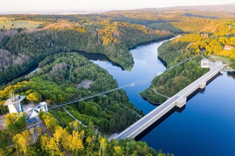 Aerial view of the Rappbode dam, dam wall and suspension bridge by Harzdrenalin, Oberharz am