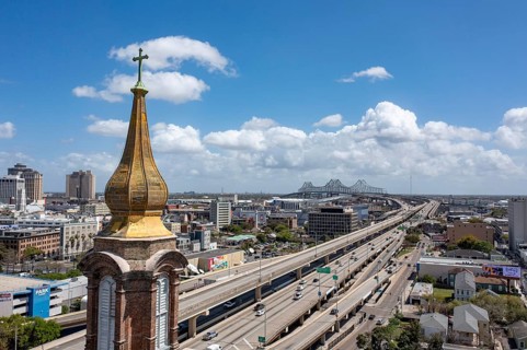 New Orleans, Louisiana - The golden steeple of St. John the Baptist Catholic Church, established in