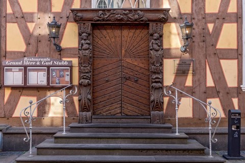 Hotel Nassau Oranien, historic half-timbered house, baroque, façade, portal with carvings by Johann