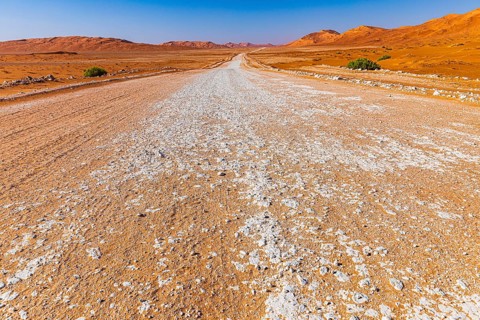 Wide road leads through the Rub al Khali desert, Dhofar province, Arabian Peninsula, Sultanate of
