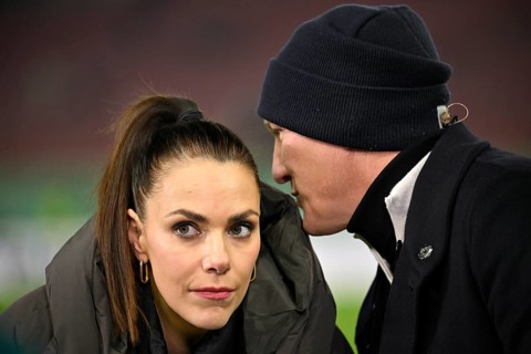 ARD TV pundit Bastian Schweinsteiger, cap, portrait in conversation with presenter Esther Sedlaczek