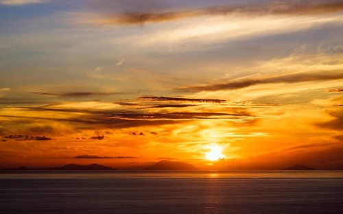 Sunset over Aeolian Islands from Nicotera, Aeolus, Sicily, Tyrrhenian Sea, Italy, Europe