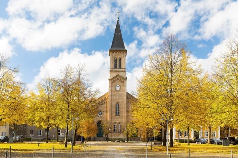 Church of the Brethren on the autumnal Zinzendorfplatz in Niesky, Saxony, Germany, Europe