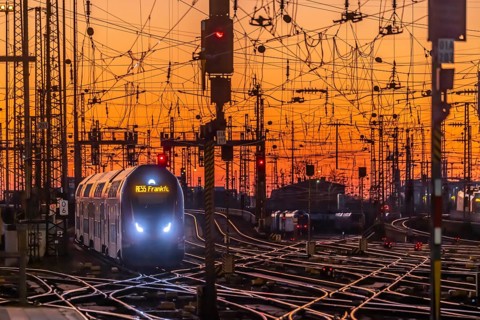 Track apron with trains, rails, points, pylons and signalling systems. Infrastructure at the main