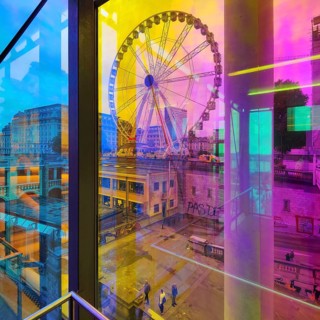 Marollescenece, art installation The Cube, coating of the windows with translucent dichroic films,