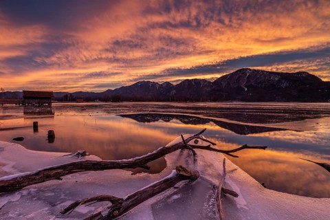 Dawn, mountains reflected in lake, clouds, ice, frozen, winter, Lake Kochel, view of Rabenkopf,