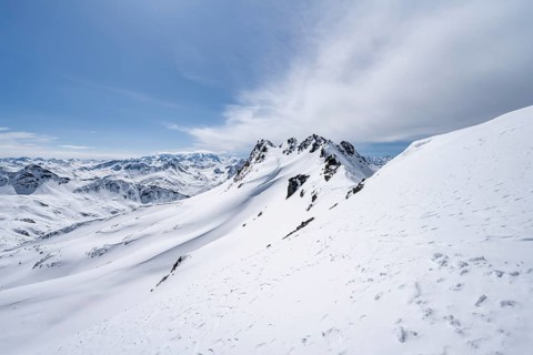 View of mountain panorama with mountain peaks of the Bernina group, mountain landscape in winter on