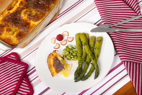 South German cuisine, green asparagus with rhubarb vinaigrette and potato gratin, healthy,