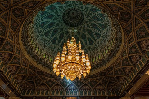 Dome and illuminated chandelier in the Sultan Qaboos Mosque, Muscat, Arabian Peninsula, Sultanate