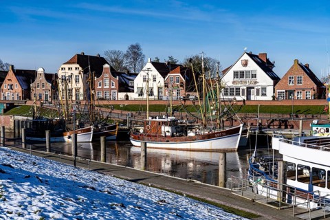The fishing village of Greetsiel, historic fishing harbour, with the largest shrimp cutter fleet in