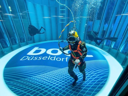 Diver helmet diver from the German Navy with hose for air supply from outside the water during