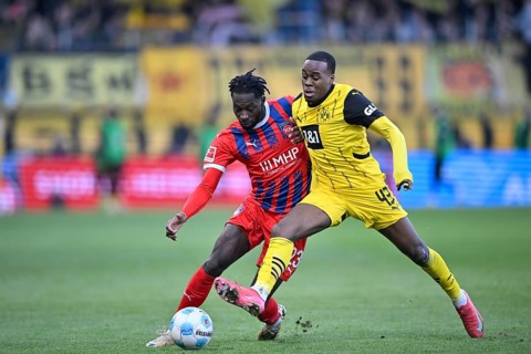Duel, action Jamie Bynoe-Gittens Borussia Dortmund BVB (43) against Omar Haktab Traore 1. FC