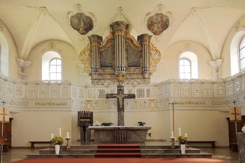 Interior view of the town church of St Symphorian, altar and organ on the gallery, Zell am