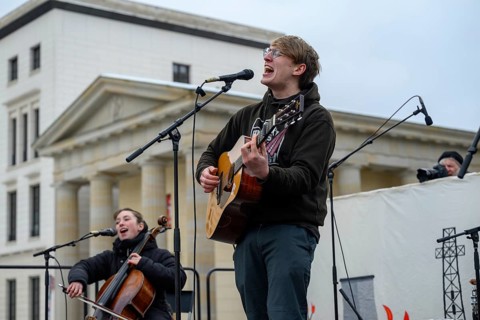 Marlo Grosshardt plays at the Fridays for Future climate strike at the Brandenburg Tor in Berlin.