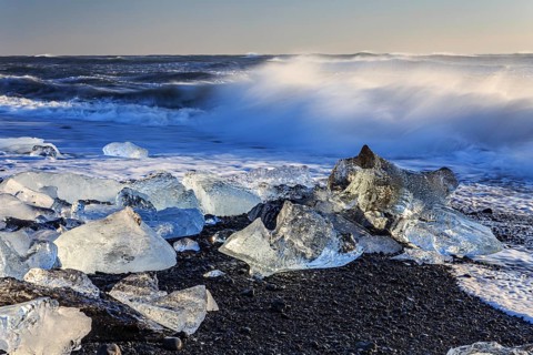 Ice floes on the beach, waves, sea, sunny, morning light, winter, Diamond Beach,