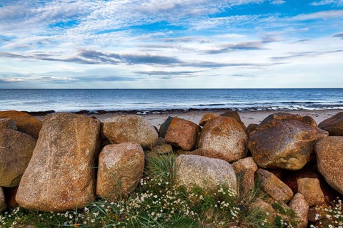 Coastal defence, boulders overlooking the sea, dusk, Carne Beach, Wexford, Gerrans Bay, Roseland
