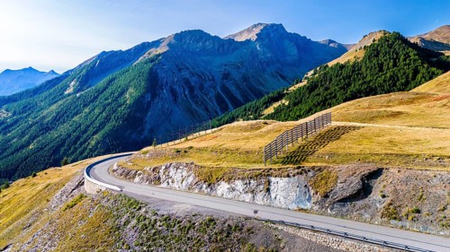 Route des Grandes Alpes, aerial view of road and mountains at pass Col de Vars, Départements