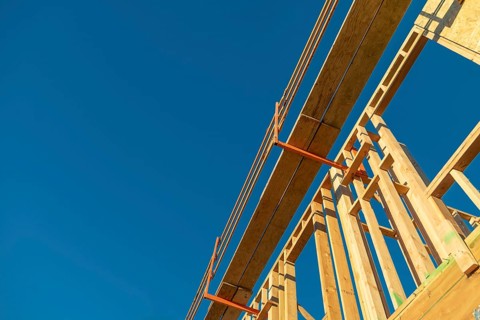 Abstract perspective of a house wood construction framing