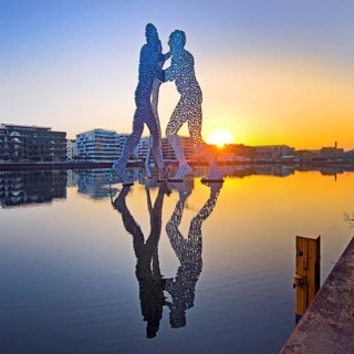 Molecule Man, monumental artwork in the Spree at sunrise, artist Jonathan Borofsky, Berlin,