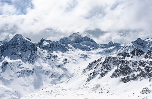 View at the summit of Piz Laviner, mountain panorama in winter, mountain landscape with mountain