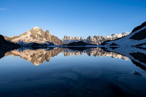 Mountain landscape in the evening light, water reflection in Lac Blanc, mountain peak, Aiguille