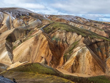 Early snow on the colorful rhyolite mountains, Landmannalaugar, Fjallabak Nature Reserve, Iceland,