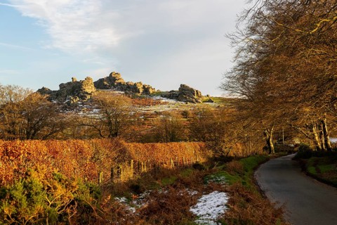 Autumn landscape of Hound Tor, road near Swallerton Gate, Dartmoor national park, north Devon,