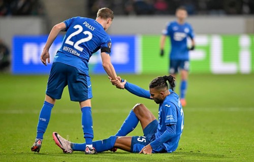 Alexander Prass TSG 1899 Hoffenheim (22) helps Kevin Akpoguma TSG 1899 Hoffenheim (25) to his feet,
