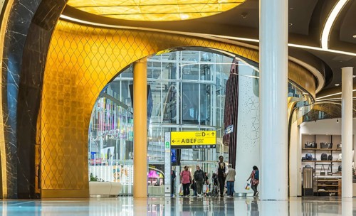 Abu Dhabi Airport, Zayed International Airport with passengers. Duty free shop. The new Terminal A