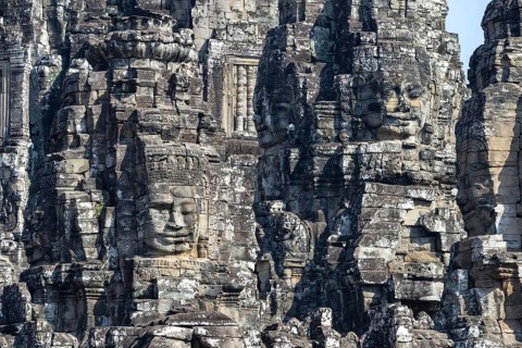 Giant stone-carved faces of the Bodhisattva Lokeshvara, also known as Avalokiteshvara, Bayon