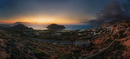 Atmospheric dusk with a view of the coast and town of Arkasa and the sea in the background, Arkasa,
