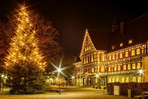 The festively decorated town hall of Münsingen at Christmas time, Swabian Alb, Reutlingen district,