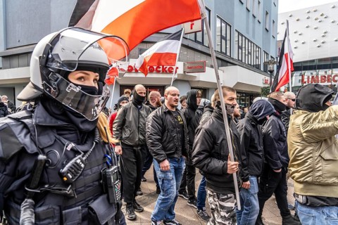 The neo-Nazi group Jung und Stark, JS, demonstrates in the city centre of Essen, demanding the