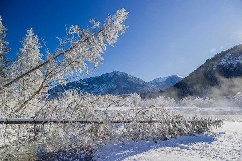 Isar valley in winter at temperatures of minus 18 degrees Celsius. Snow covered landscape with the