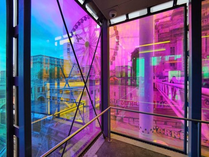 Marollescenece, art installation The Cube, coating of the windows with translucent dichroic films,