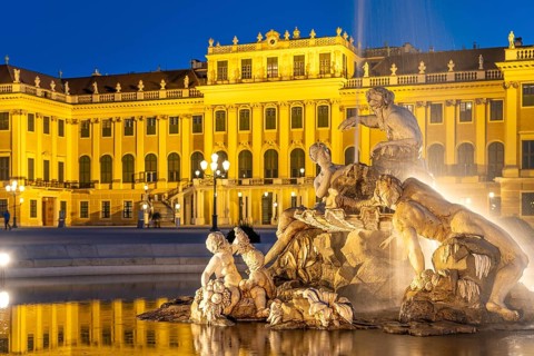 Fountain in the courtyard of honour at Schönbrunn Palace at dusk, UNESCO World Heritage Site in